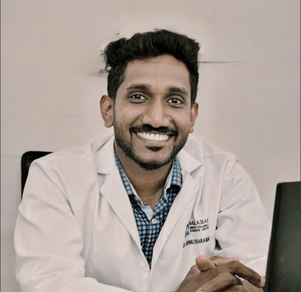 Dr. Jishnu S